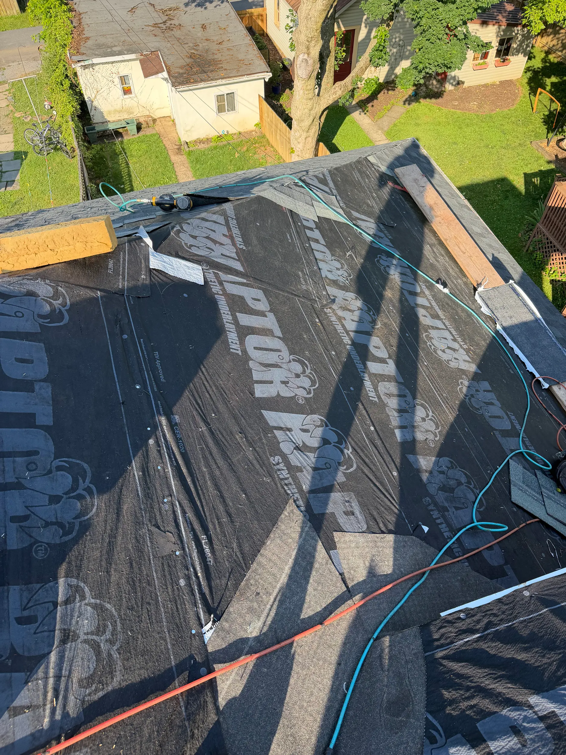 Aerial view of roof underlayment being installed during a Lancaster County re-roof
